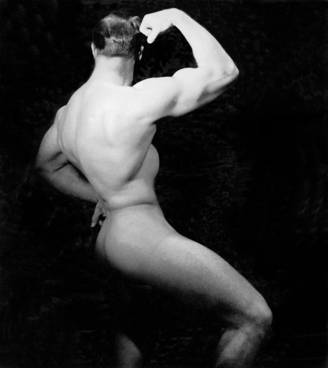Naakte bodybuilder zijaanzicht, San Francisco, Californië, ca. 1950 door Unknown