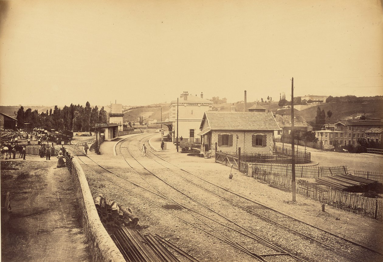 Spoorwegovergang en station, L