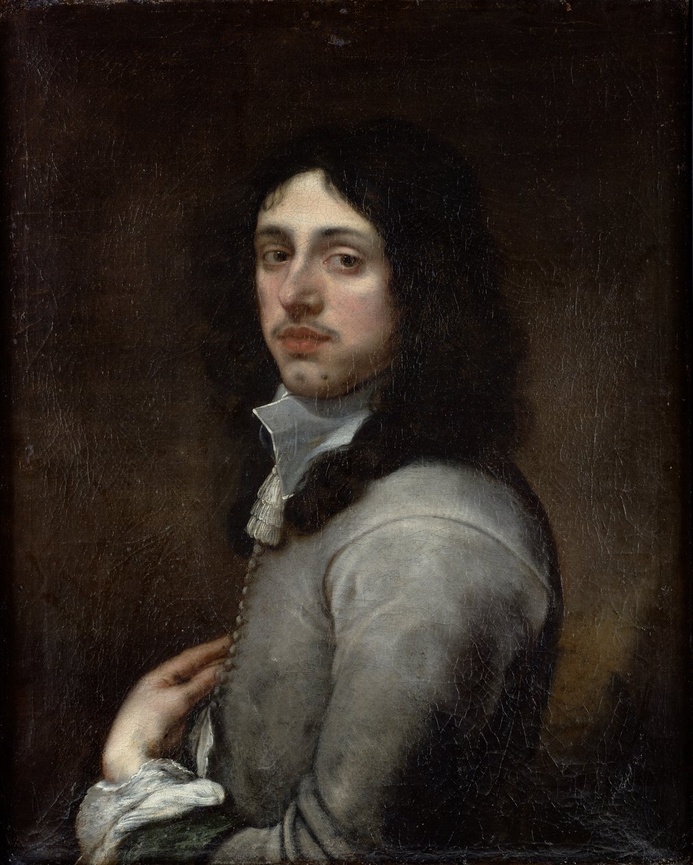 Portret van een jonge man gekleed in grijs door Bartolomé Esteban Murillo