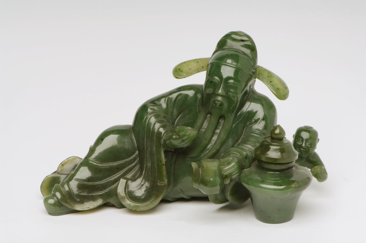 Liggende Chinese geleerde figuur (jade) door Chinese School