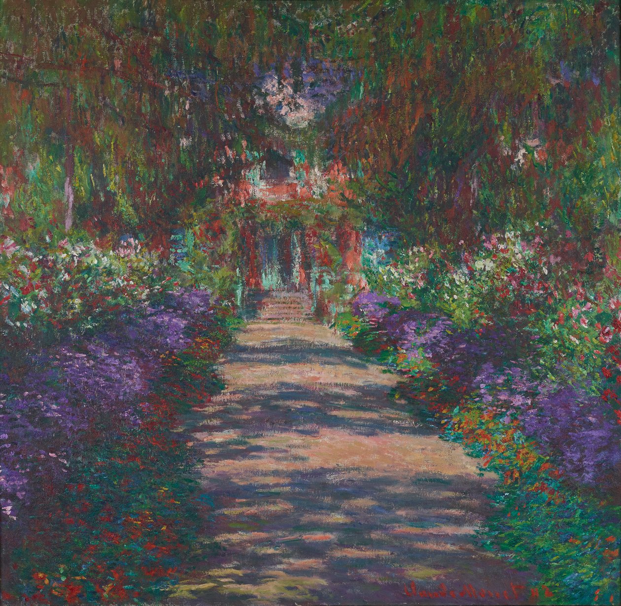 Een laan in Monets tuin in Giverny door Claude Monet