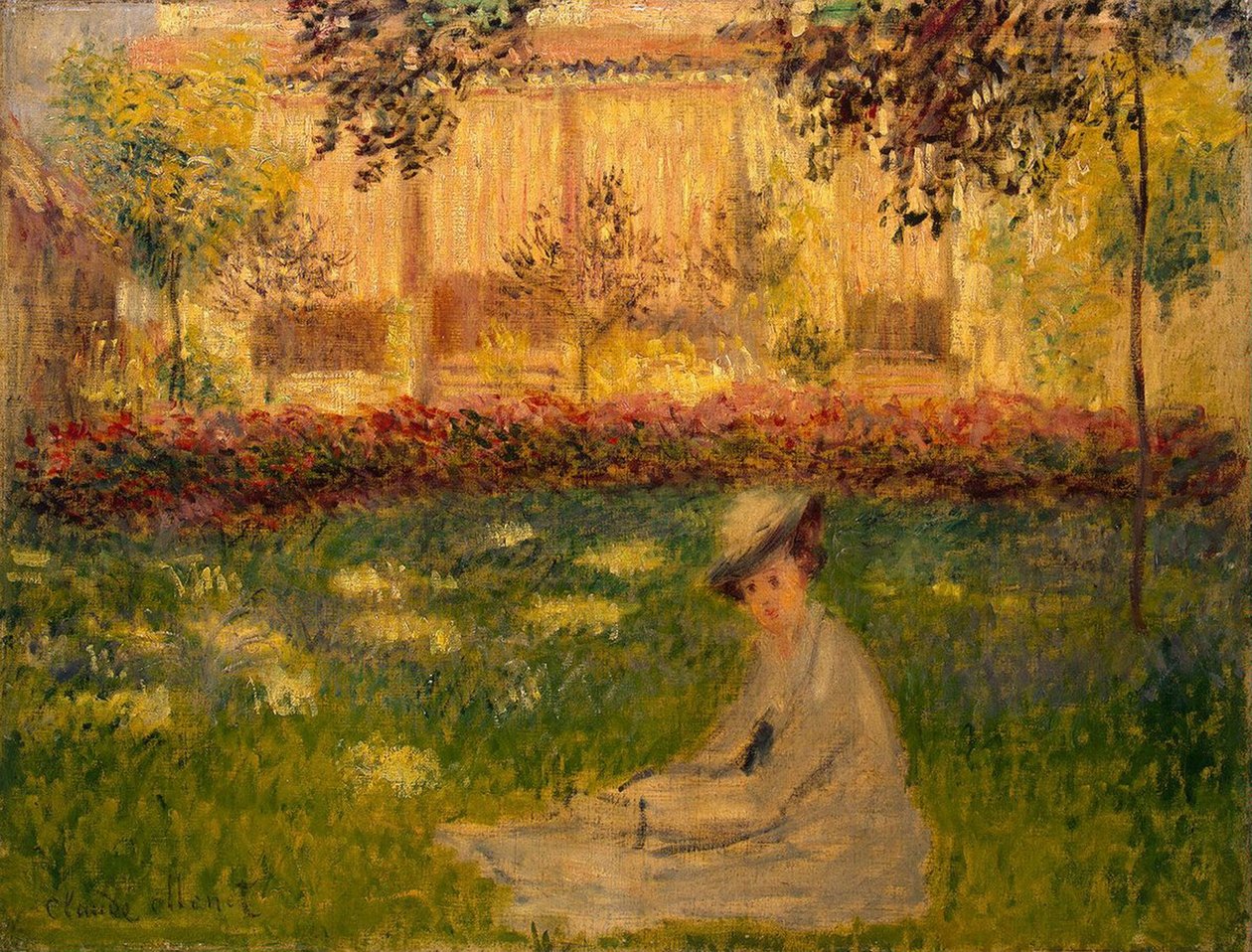 Vrouw in een tuin door Claude Monet