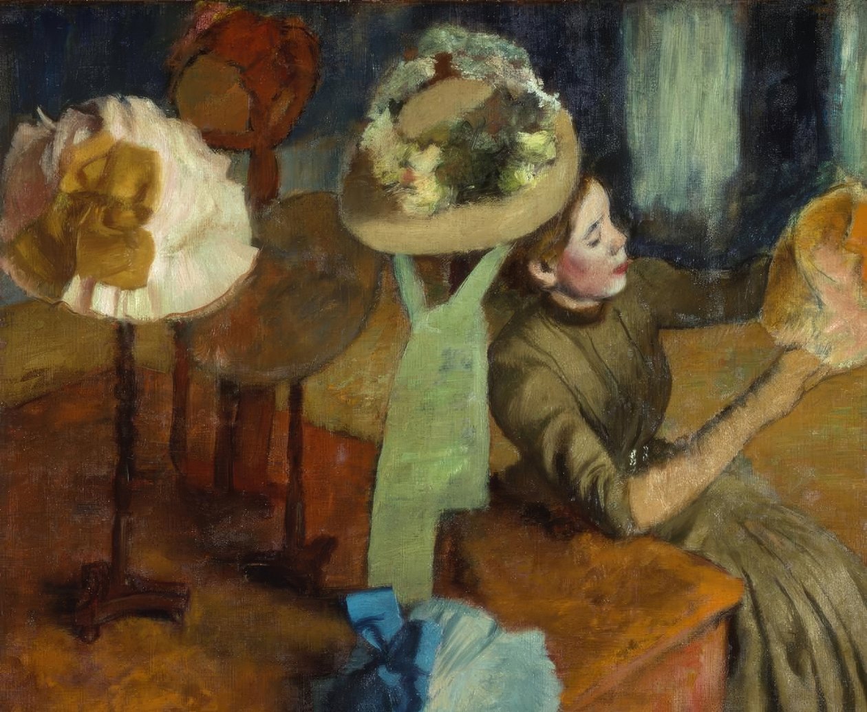 Bij de hoedenmaakster door Edgar Degas