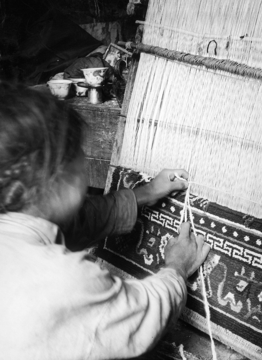 De tapijtwever, Gyantsé, Tibet door Fosco Maraini