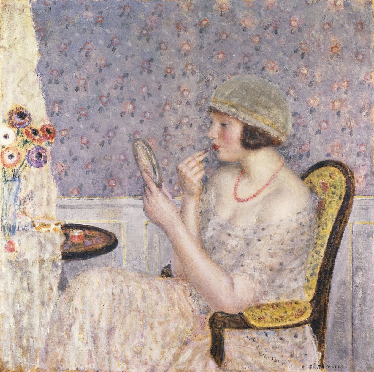 Vrouw aan een kaptafel door Frederick Carl Frieseke