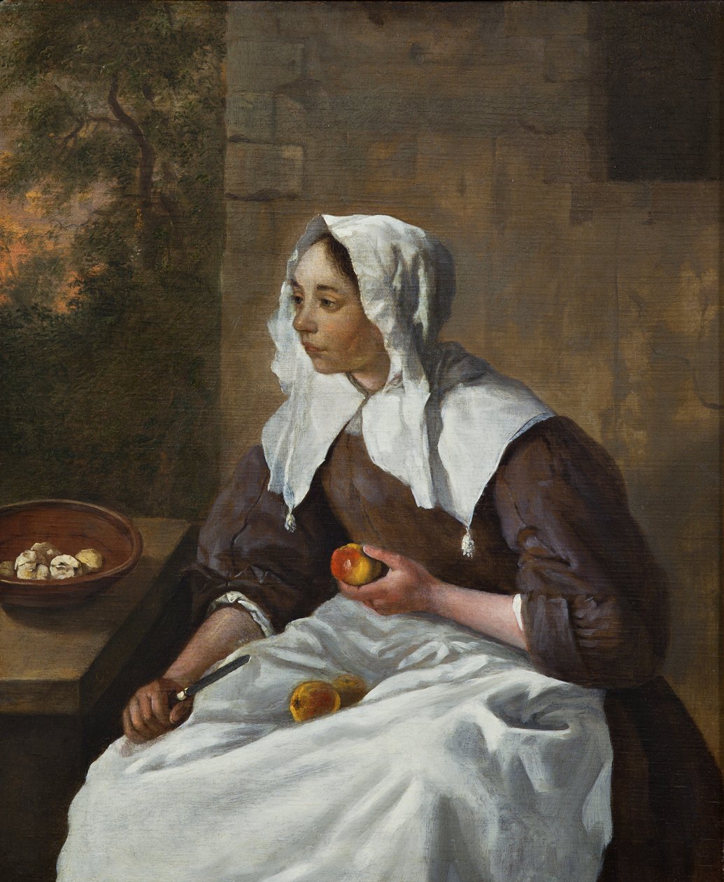 Meisje die appels schilt door Gabriel Metsu