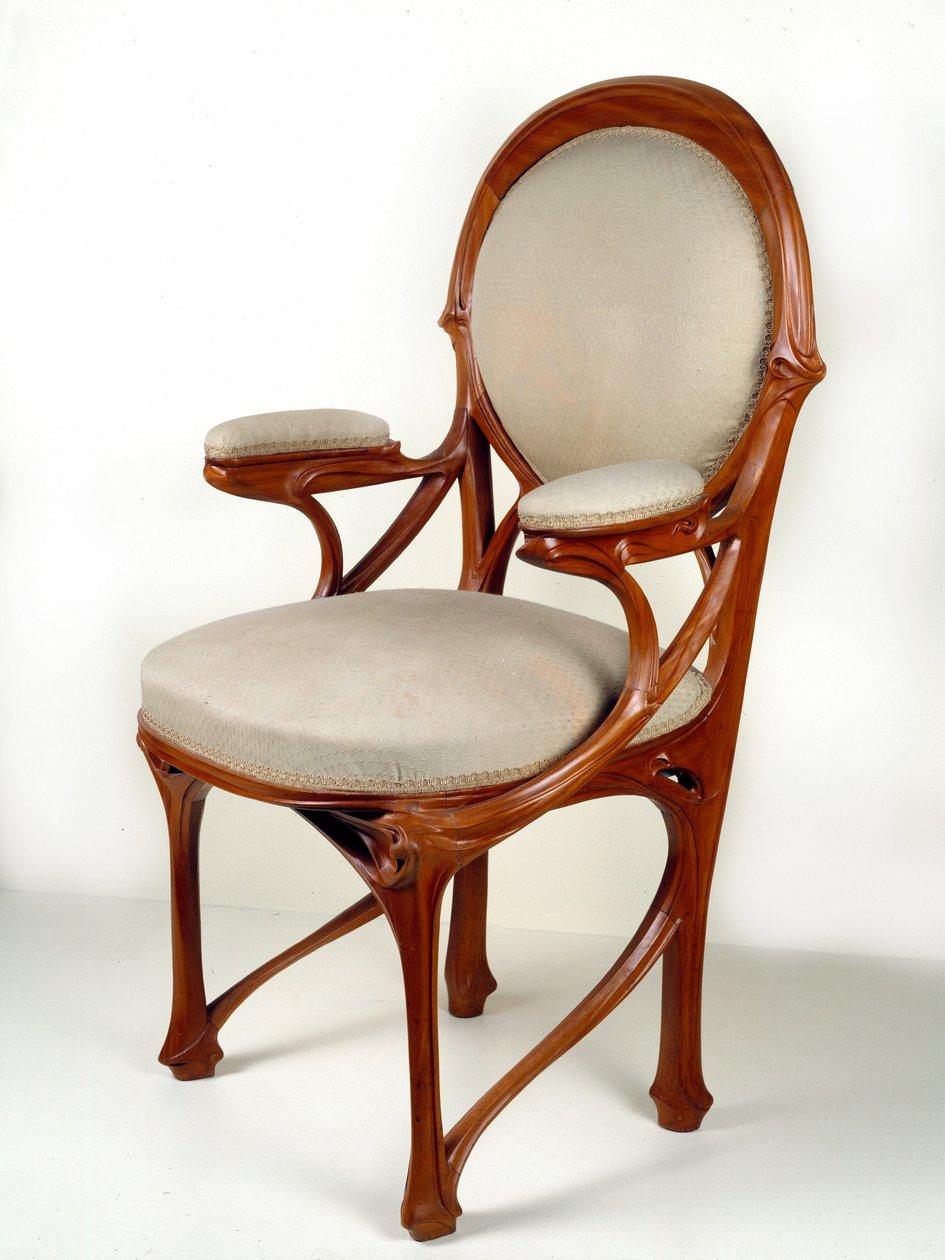 Art Nouveau: Amerikaanse walnoot fauteuil door Hector Guimard
