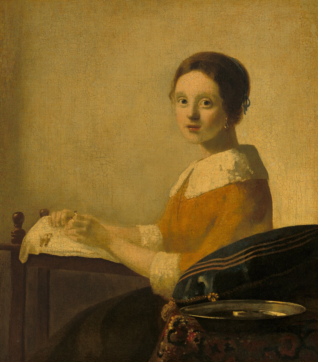 De kantwerkster door Imitator of Johannes Vermeer