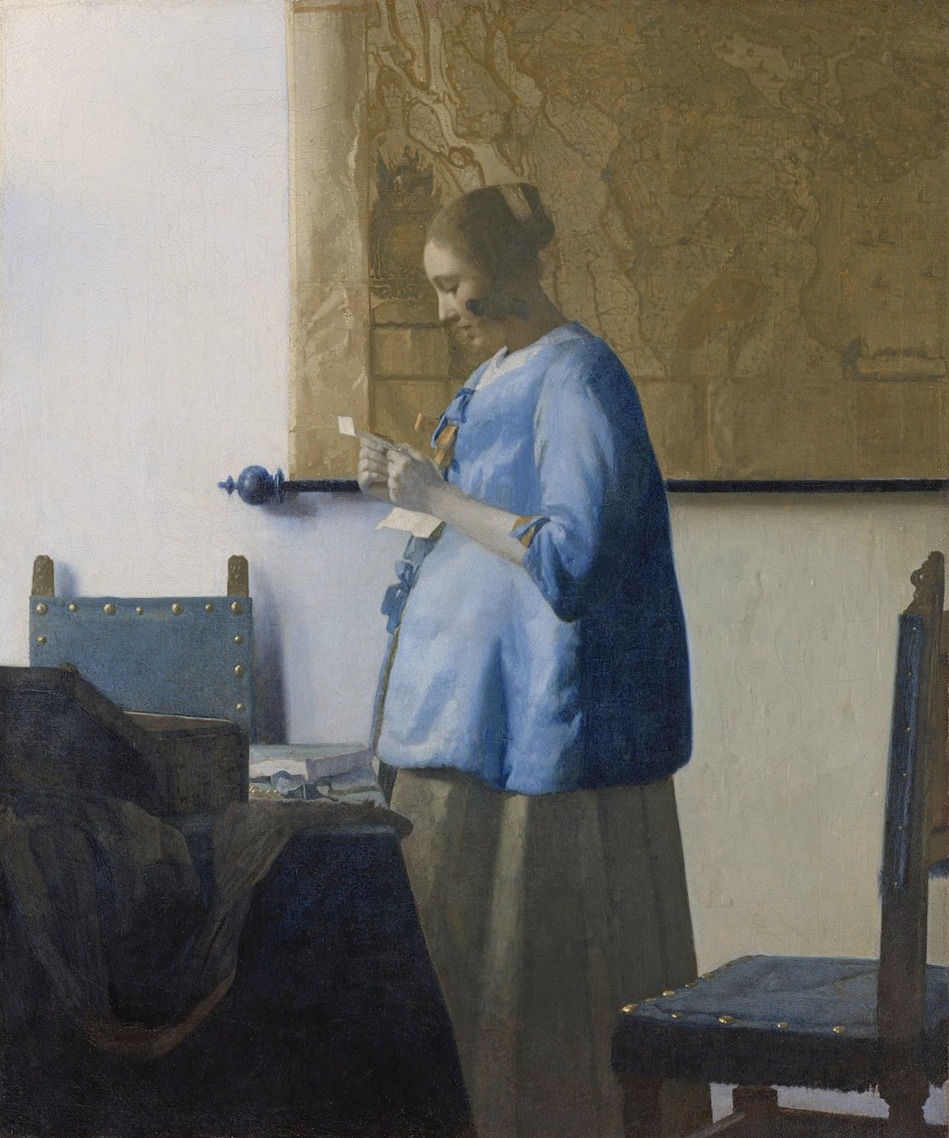 Vrouw die een brief leest door Jan Vermeer van Delft