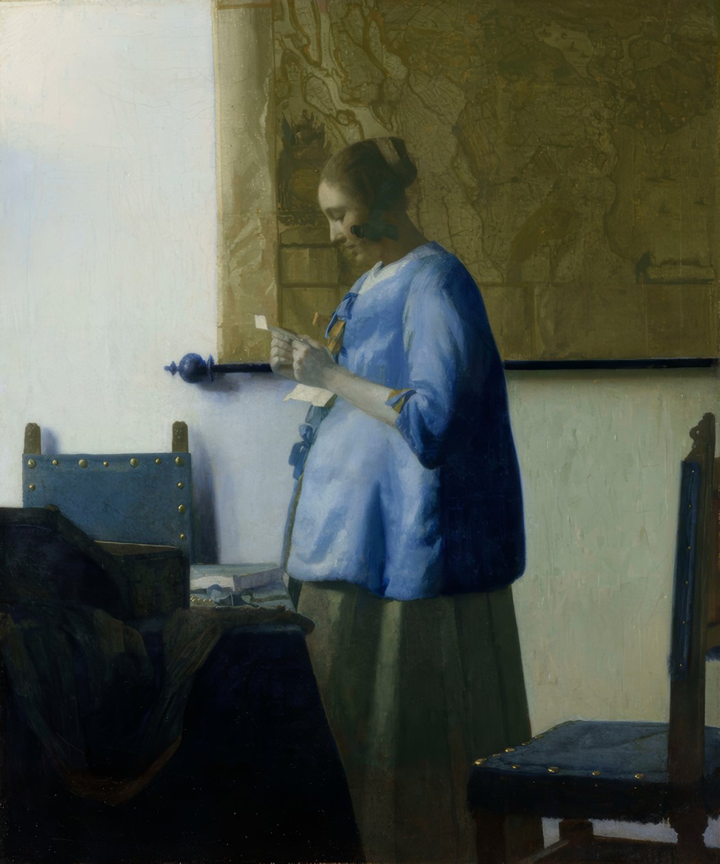 Brieflezeres in blauw door Jan Vermeer van Delft