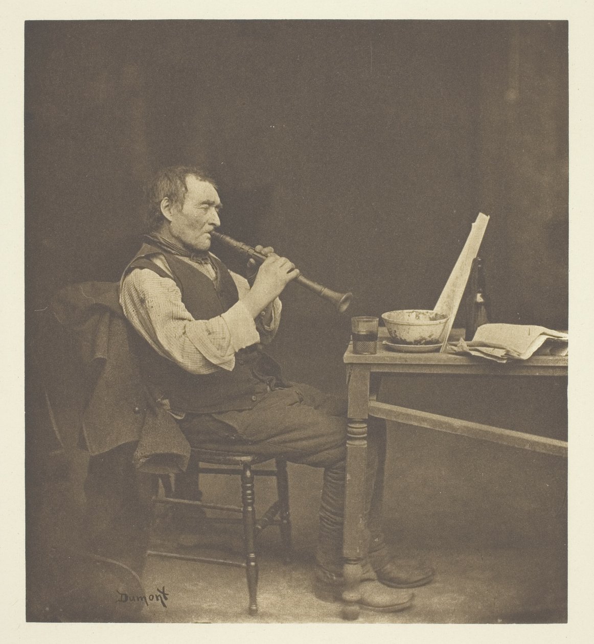 Klarinetspeler door John E. Dumont