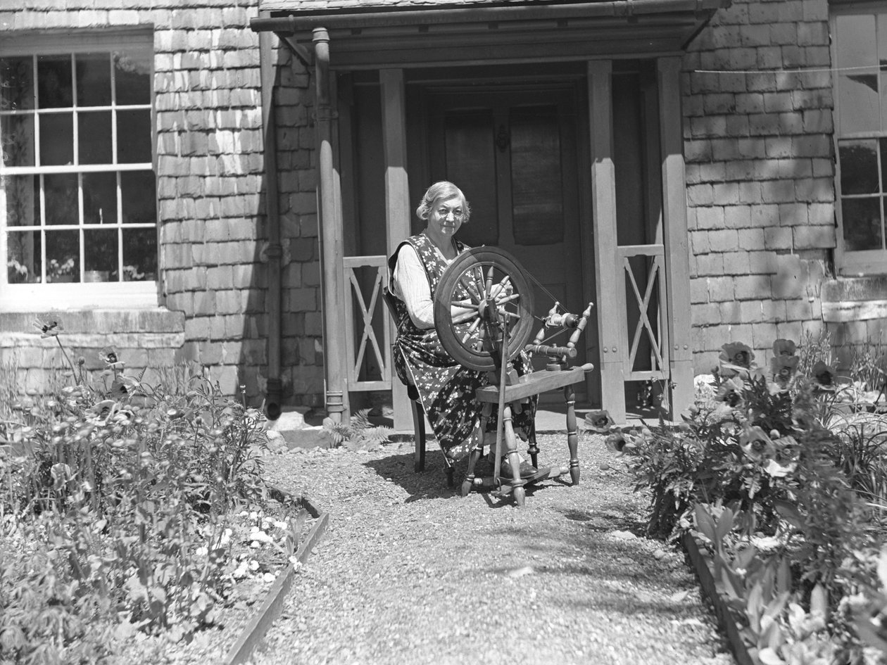 Spinner met spinnewiel in Tilberthwaite door Joseph Hardman