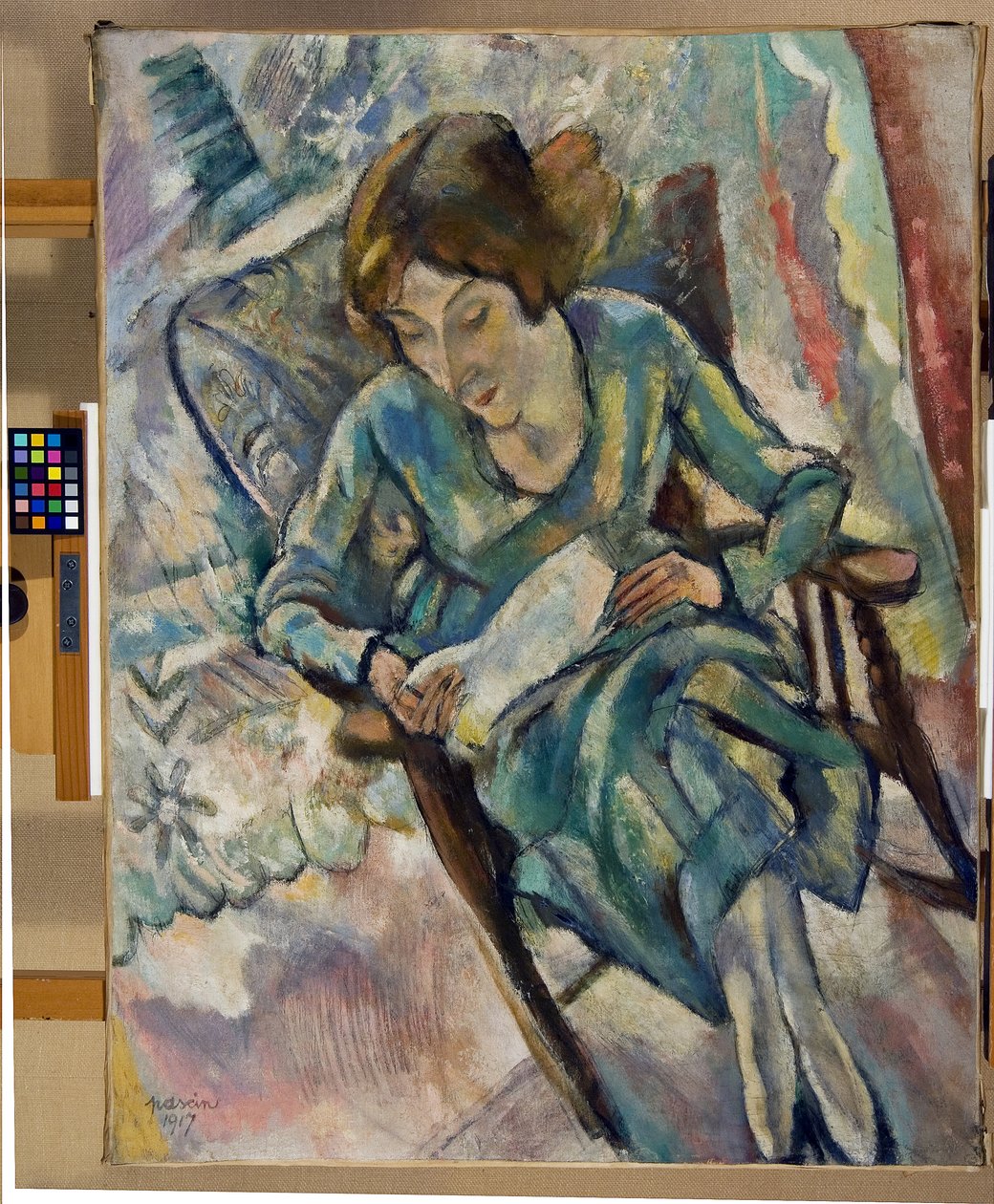 Meisje in groen aan het lezen, 1917 door Jules Pascin