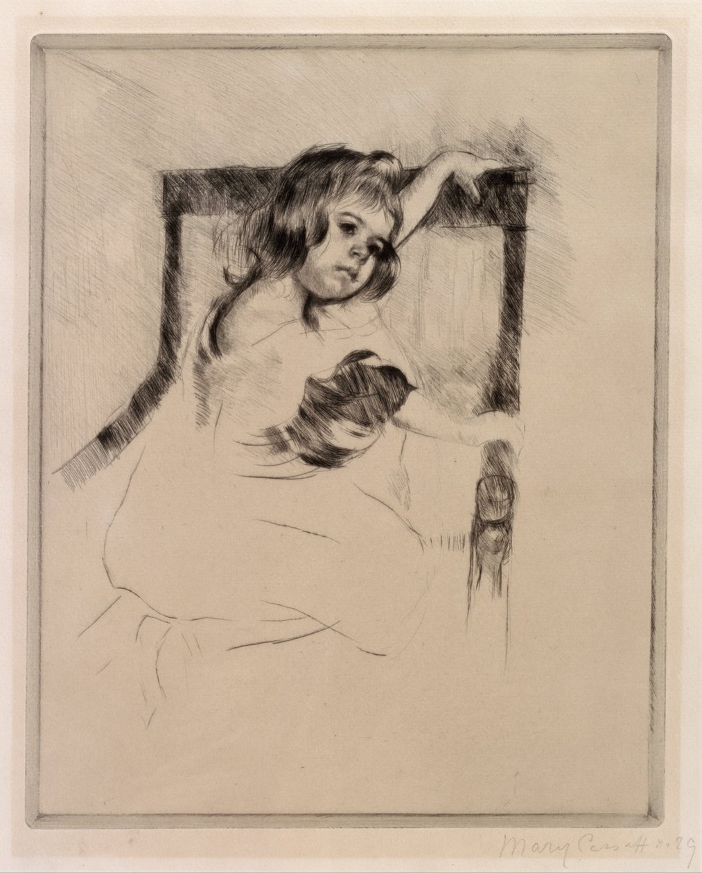 Knielend in een Fauteuil door Mary Cassatt