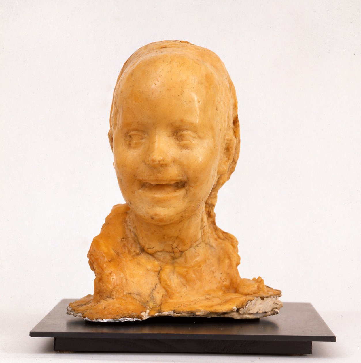 Het lachende meisje door Medardo Rosso