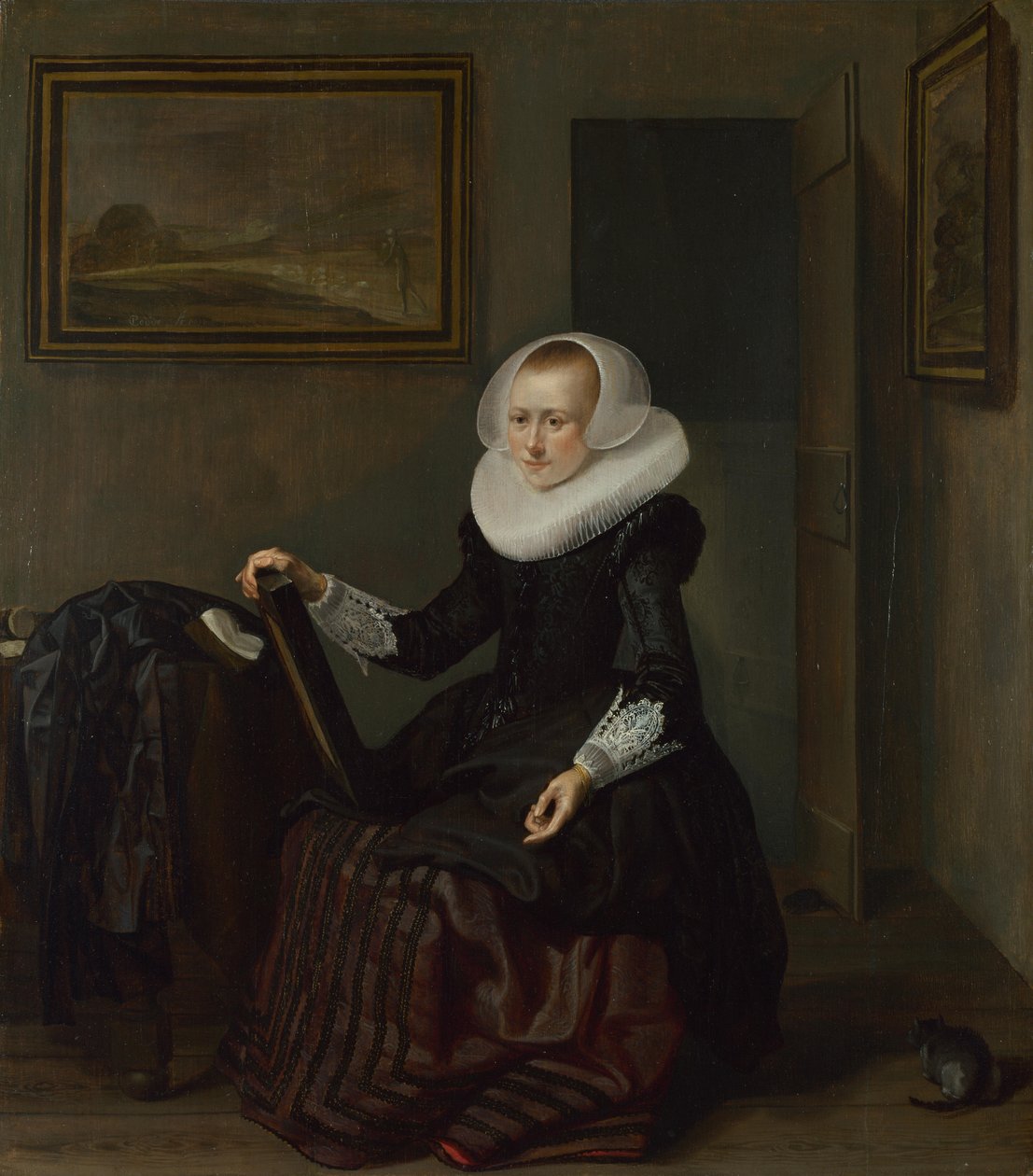 Een vrouw die een spiegel vasthoudt, 1625 door Pieter Codde