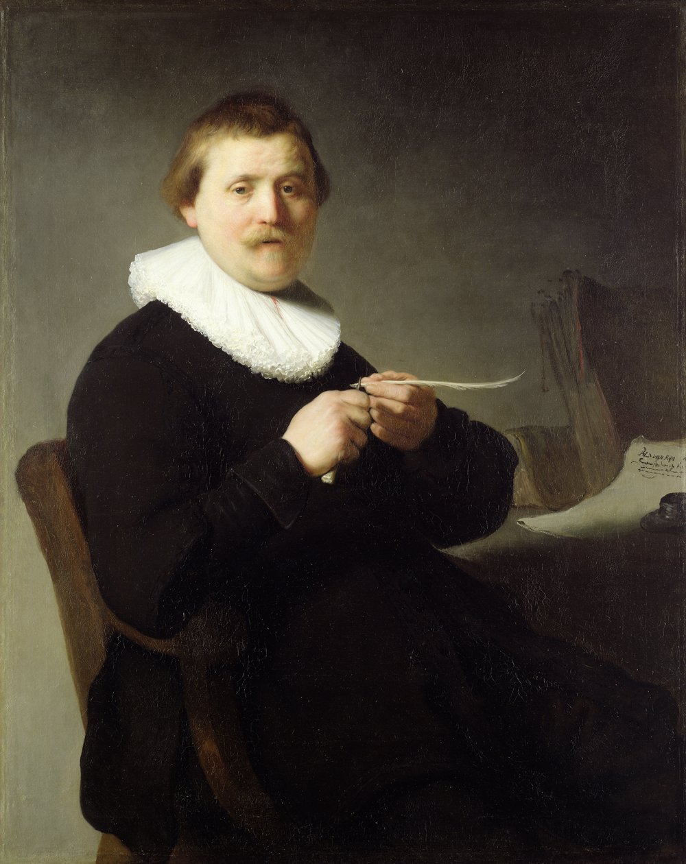 Man die een pen scherpt door Rembrandt van Rijn