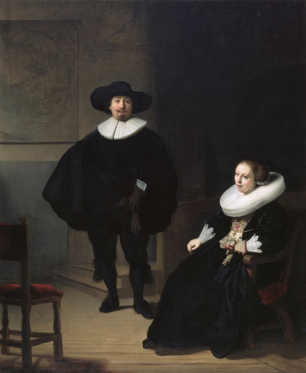 Een dame en heer in het zwart door Rembrandt van Rijn