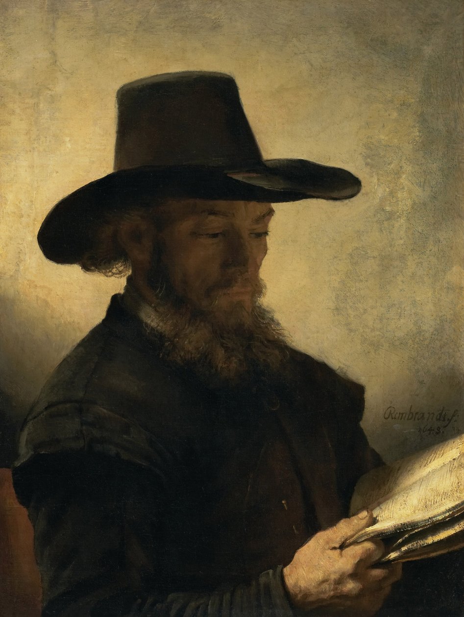 Man die leest door Rembrandt van Rijn