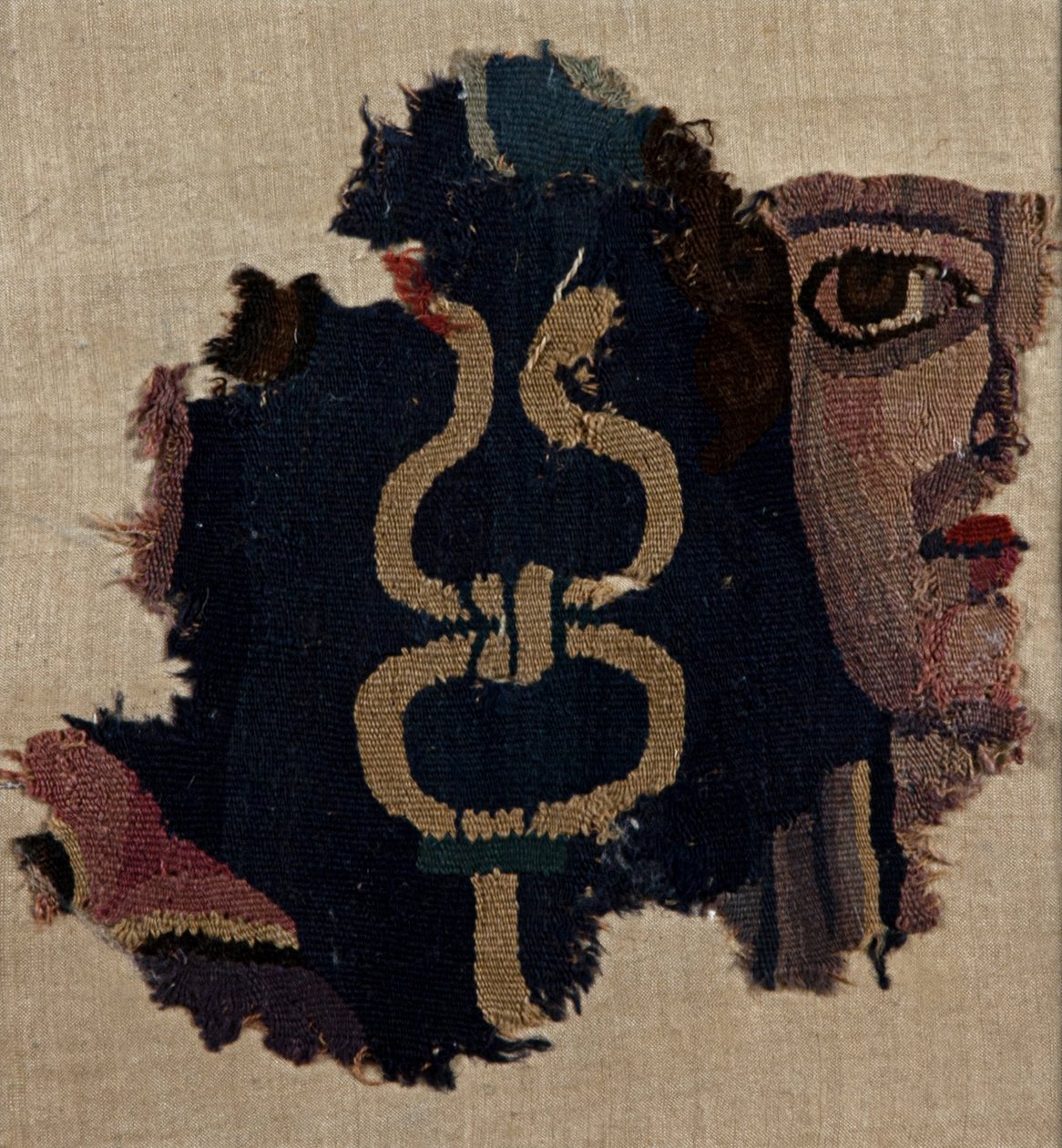 Mannelijk gezicht met een caduceus door Unbekannt Unbekannt