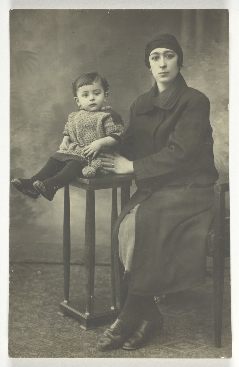Untitled Postcard (Woman with Boy on Stand) door Unknown