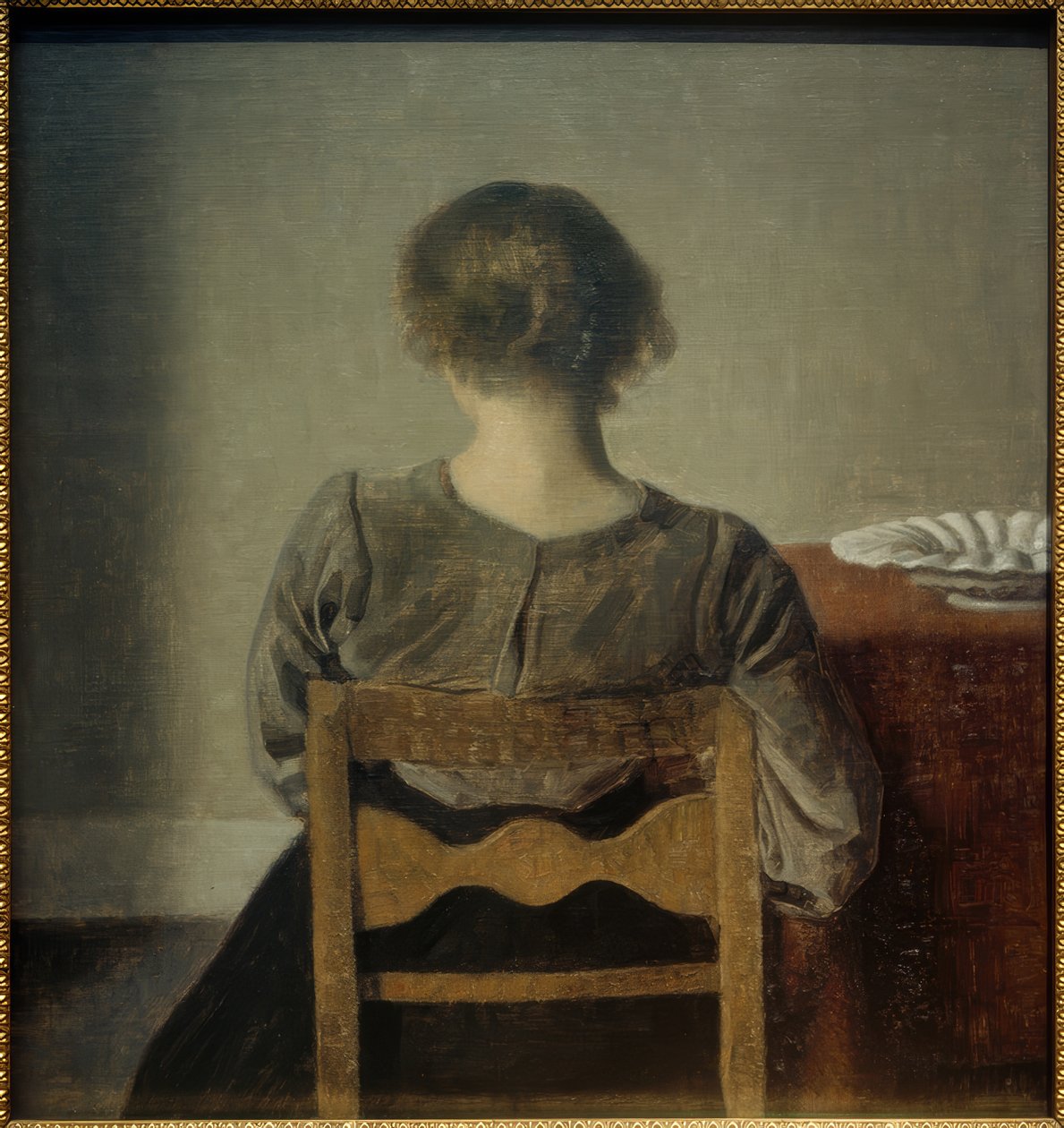 Jonge vrouw. Rustpauze door Vilhelm Hammershoi