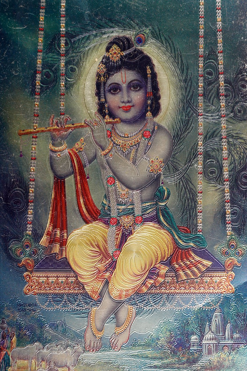 Heer Krishna met fluit. Hindoegod door . .
