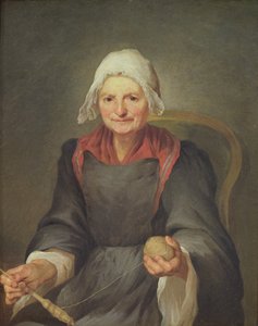 Een oude vrouw aan het spinnen