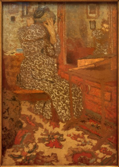 Bij het kammen door Edouard Vuillard