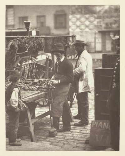 De Straatslotenmaker door John Thomson