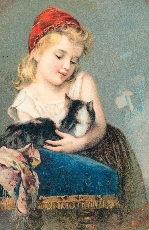 Een jong meisje poseert met een kat door English School