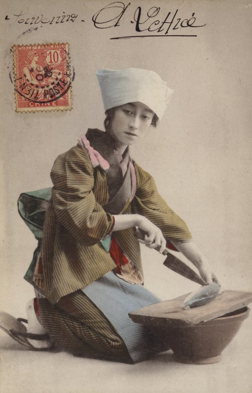 Japans meisje fileert vis door French Photographer